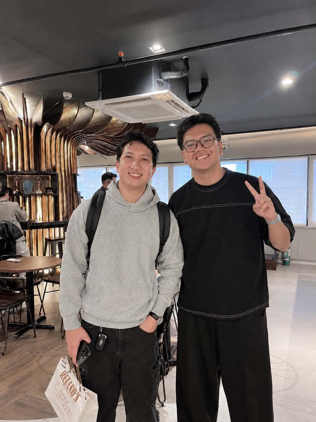 Gene with Bryl Lim, founder of App Builders PH, at the AppBuildersPH Hackathon 2026